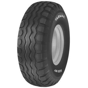10.0/75-15.3 implement tire with wide tread and rounded shoulders designed for agricultural trailers and soft field operation